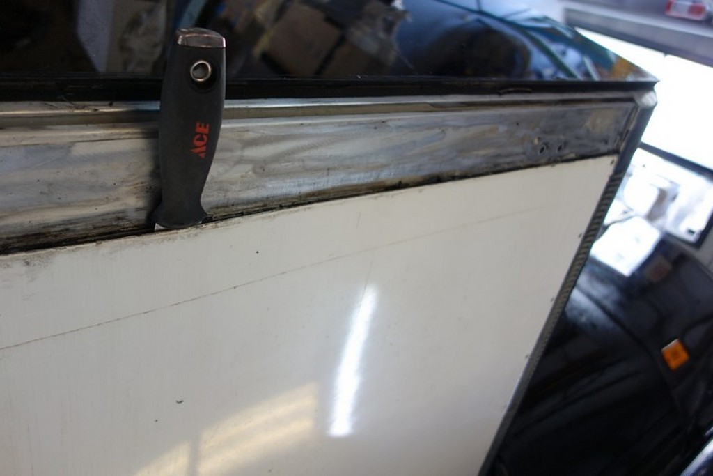 000a - Prevost XLII salon slide roof panel loose causing extensive damage inside repaird by Excalibur Coach (1).jpg