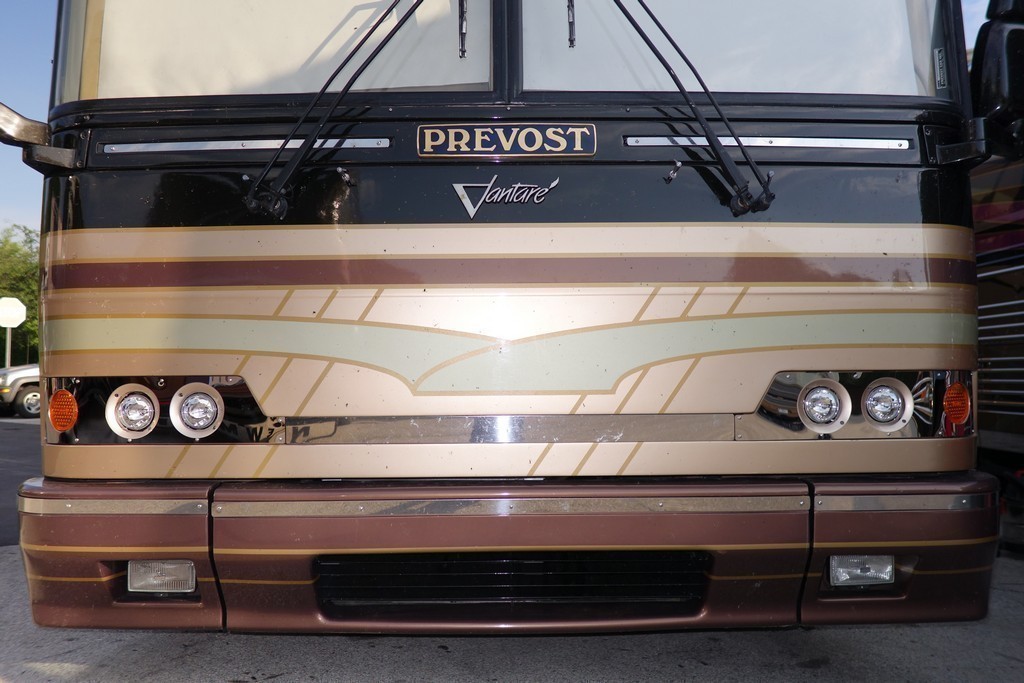 001 Prevost H3-45 Vantare Featherlite after headlight upgrade by Excalibur Coach.jpg