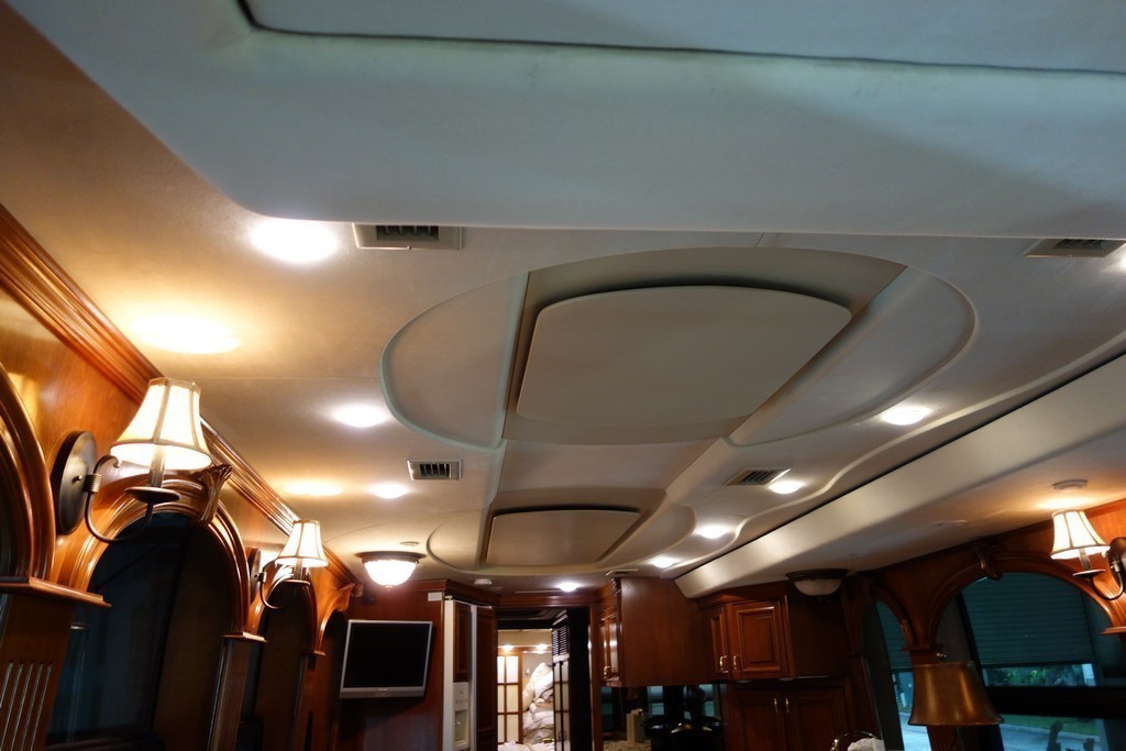 006  1999 Prevost XLII Country Coach Excalibur Coach ceiling before new design with ultra leather accents.jpg